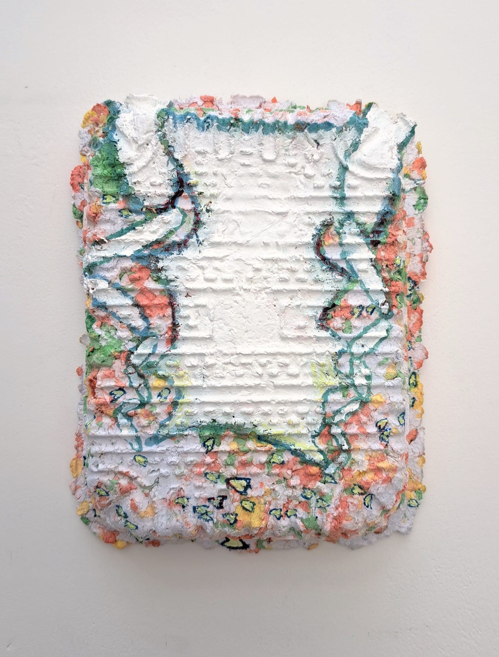 Encounter, 2026. Oil paint, coloured pencil, gesso, paper pulp cast.