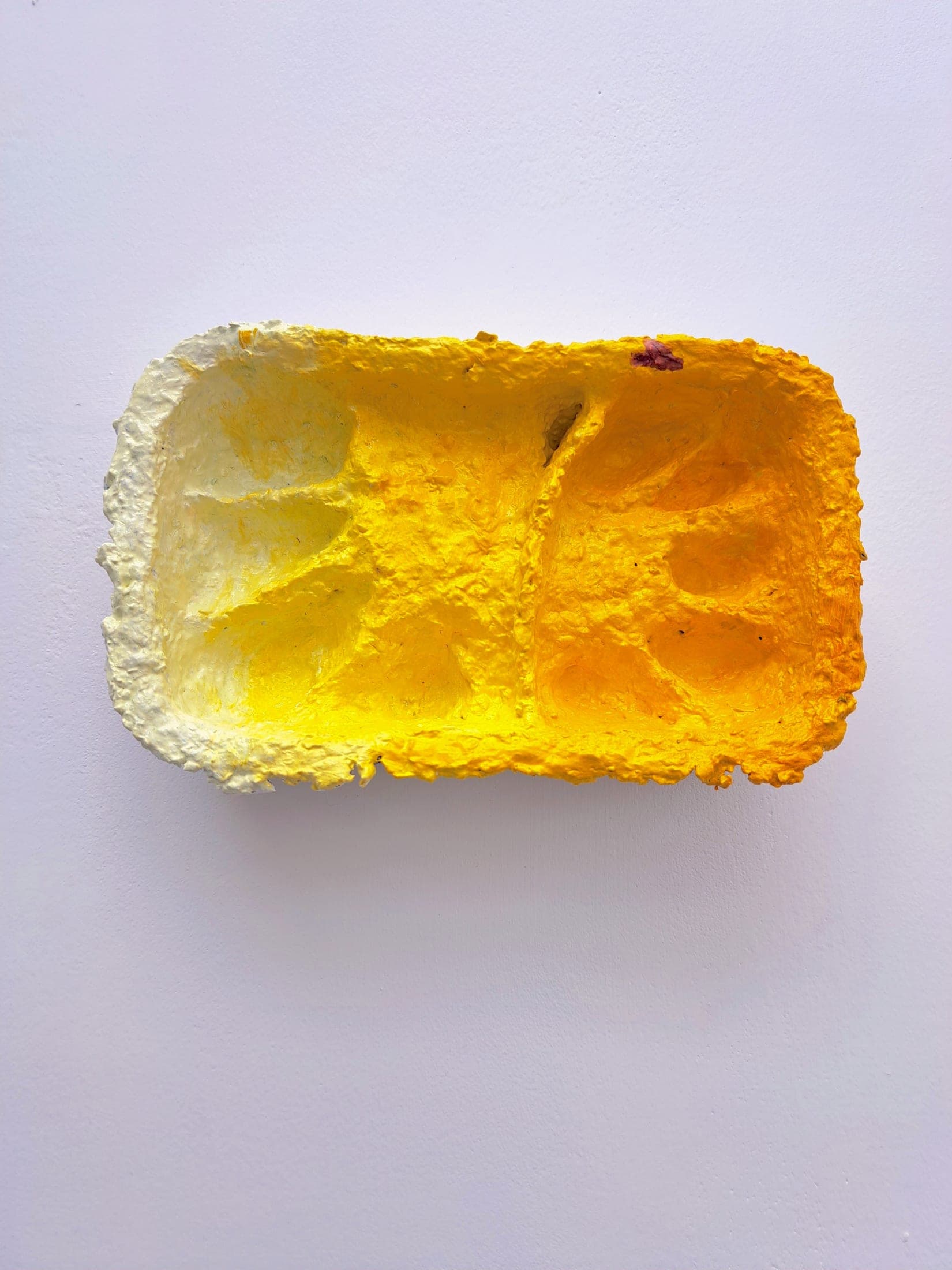 Glaze between buffers, 2026. Oil paint, coloured pencil, gesso, paper pulp cast.