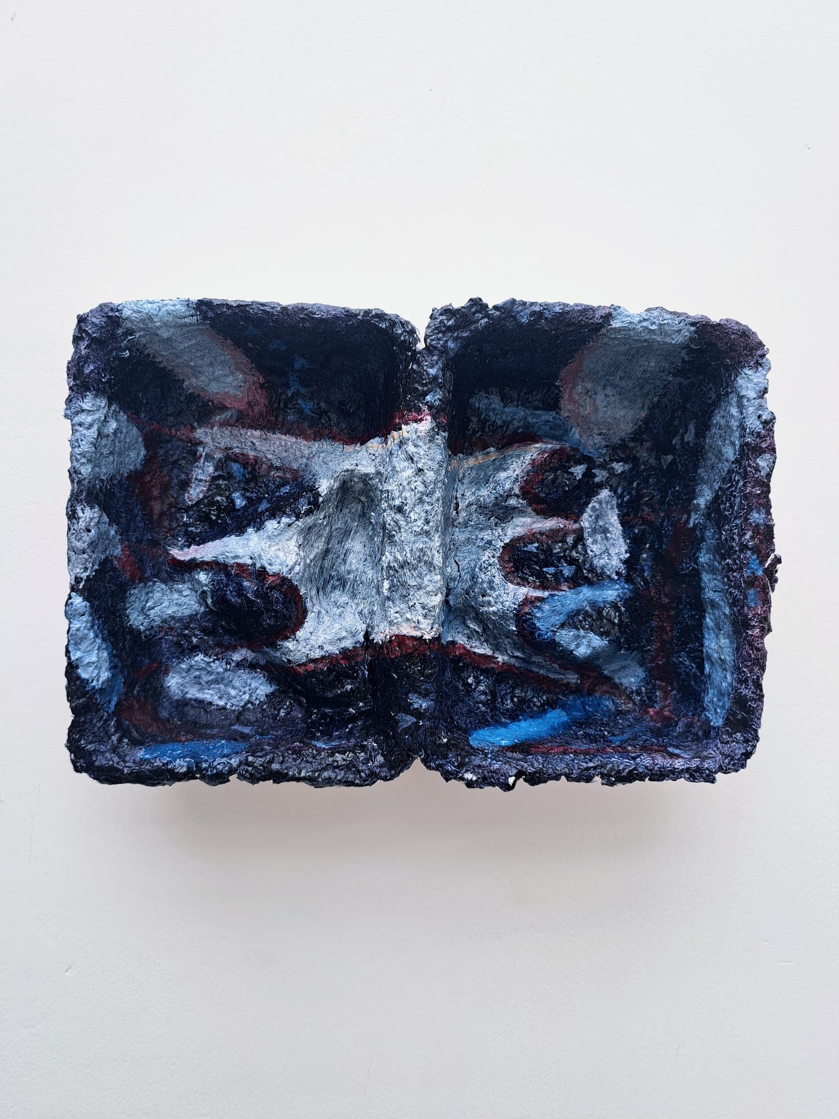 Space before, 2026. Oil paint, coloured pencil, gesso, paper pulp cast.